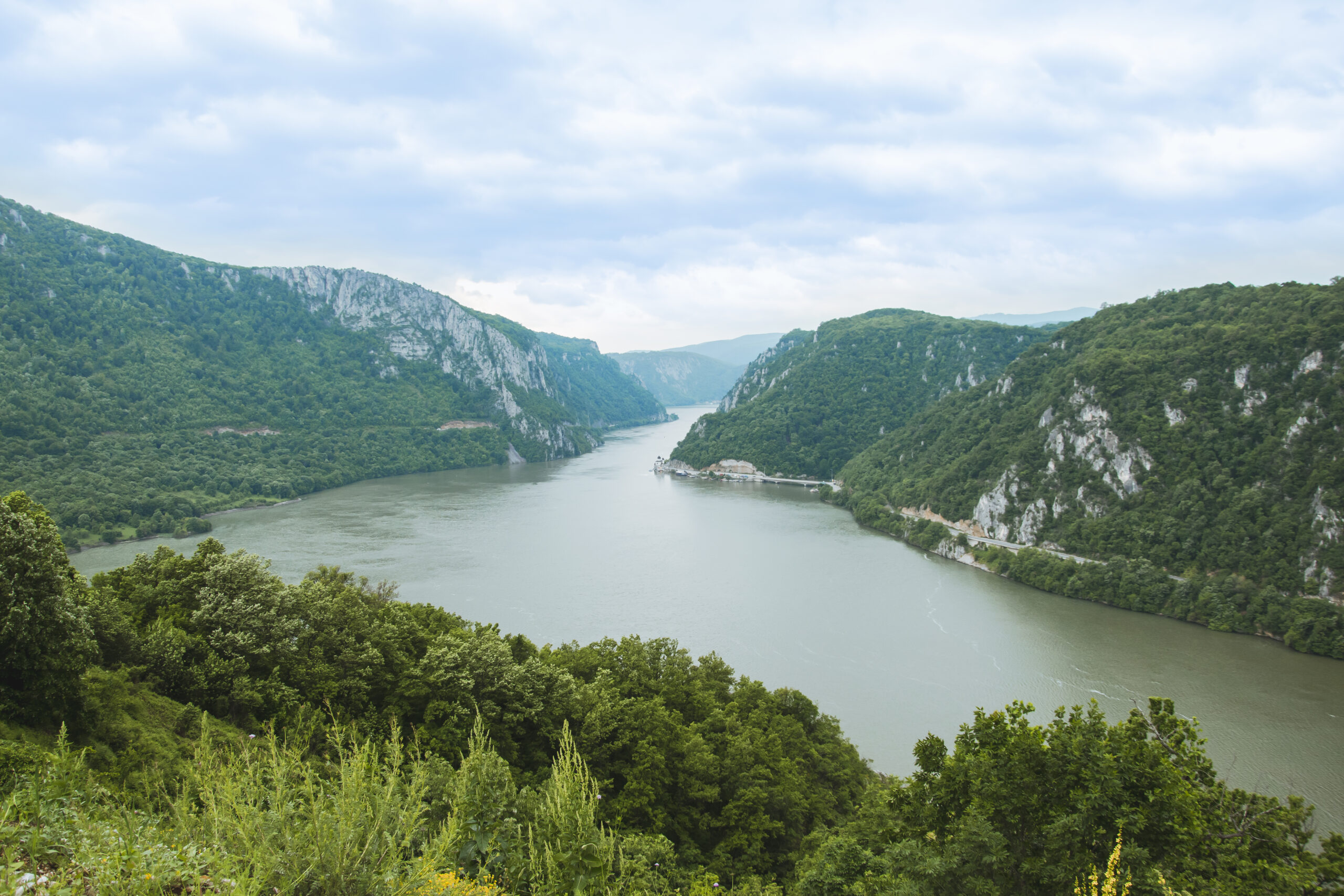 The Danube passing between forested cliffs at the Iron Gate