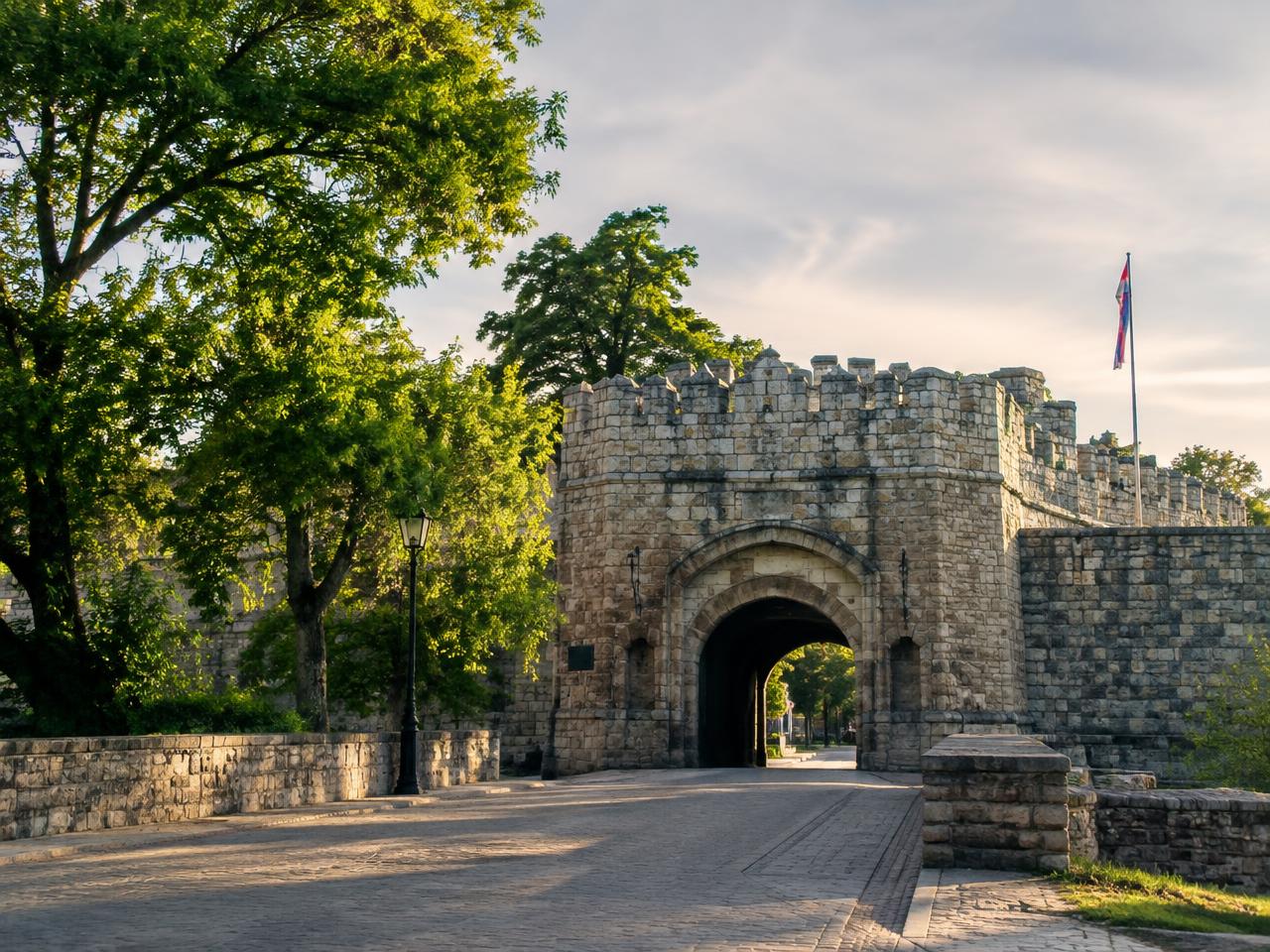 Stone gate of Niš Fortress in warm evening light
